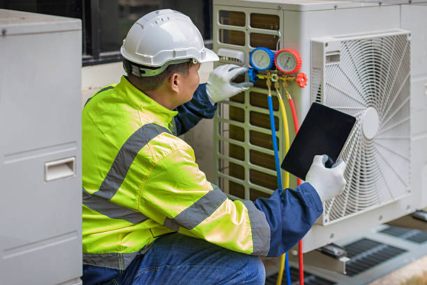 Professional Air Conditioning Repair technician working in Rolling Prairie, IN